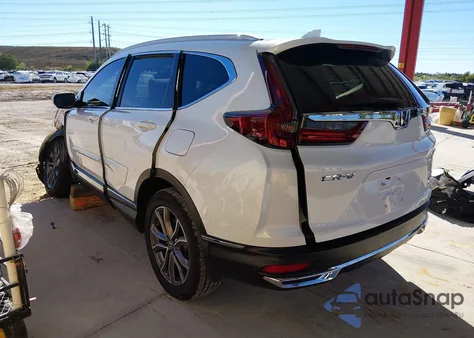 2021 Honda Cr-V Hybrid Touring z USA, uszkodzony, nr VIN 7FART6H9XME020353